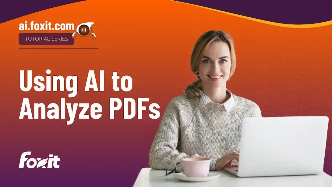 A person sitting at a table with a laptop open in front of them, wearing a light gray sweater with a white collared shirt underneath. The background features a gradient of orange and purple, with the text 'Using AI to Analyze PDFs' in bold white letters. The Foxit logo is displayed in the lower left corner, and the top includes the website 'ai.foxit.com' and 'TUTORIAL SERIES'