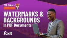 A person wearing a grey plaid blazer holds a laptop, appearing focused while working. The background is a vibrant purple gradient featuring the text "WATERMARKS & BACKGROUNDS in PDF Documents" and the Foxit logo at the bottom left. The top left corner displays the title "PDF Editor+ TUTORIAL SERIES" along with a cartoon fox character wearing glasses.